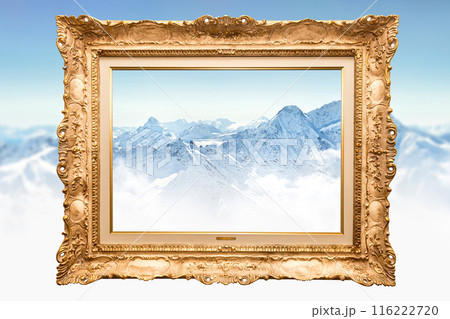 Wooden golden vintage painting frame over snowy mountain background. Concept of blending classic art with nature beauty Wooden golden vintage painting frame over snowy mountain background. Concept of blending classic art with nature beauty 116222720