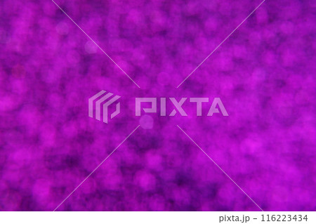 Abstract defocused shiny sparkle purple glitter bokeh background Abstract defocused shiny sparkle purple glitter bokeh background 116223434