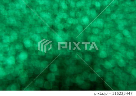 Abstract defocused shiny sparkle green glitter bokeh background 116223447