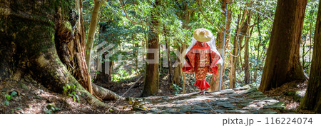 Japanese woman wearing traditional Heian Period costume at the Kumano Kodo Pilgrimage Route in Wakayama prefecture of Japan Japanese woman wearing traditional Heian Period costume at the Kumano Kodo Pilgrimage Route in Wakayama prefecture of Japan 116224074