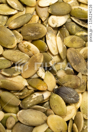 Peeled pumpkin seeds, kernels close-up Peeled pumpkin seeds, kernels close-up 116224116