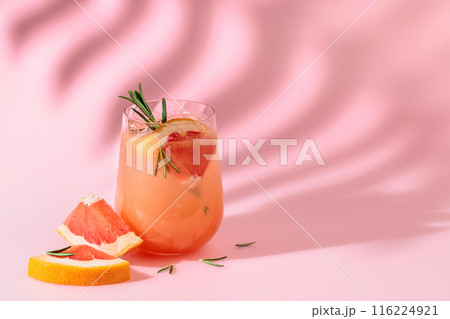 Summer cocktail with grapefruit, rosemary, and ice. Summer cocktail with grapefruit, rosemary, and ice. 116224921