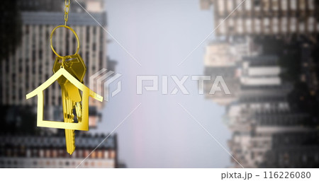 Image of hanging house keys against inverted tall buildings against grey sky Image of hanging house keys against inverted tall buildings against grey sky 116226080