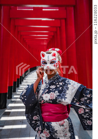 Asian girl in kimono and umbrella in Japanese theme park Hinoki Land in Chai Prakan District, Chiang 116228033