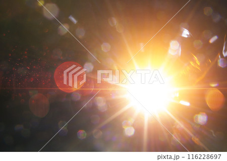 Abstract imitation sun starlight distant galaxy on a black background. 116228697