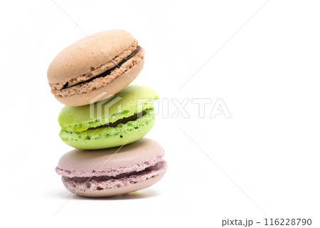 Pile of colorful macarons isolated white background 116228790