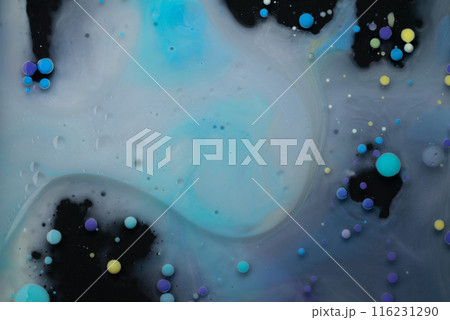 A myriad of oil droplets intermingling with water, creating a mesmerizing effect reminiscent of a galaxy. 116231290