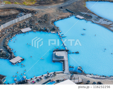 Aerial view of the Blue lagoon in Iceland. The most famous and popular SPA place in Iceland. Landscape from air. Vacation image. Blue and hot water in geothermal lake. 116232256