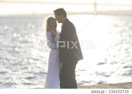 Couple Dancing at Sunset by the Bay Couple Dancing at Sunset by the Bay 116232710