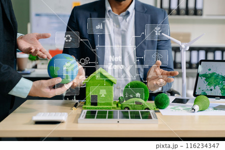 Business team people planning hand using laptop for working technology and business Net zero and carbon neutral concept.NET ZERO 116234347