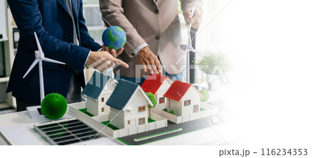 Business team people planning hand using laptop for working technology and business Net zero and carbon neutral concept.NET ZERO 116234353