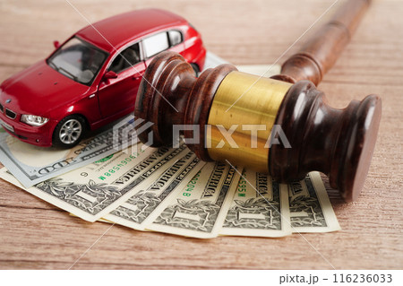 Bangkok, Thailand March 15, 2023 Car accident lawsuit and insurance, Judge hammer with car model. 116236033