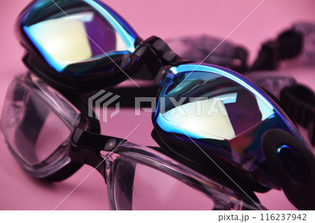 Swimming goggles on pink background 116237942