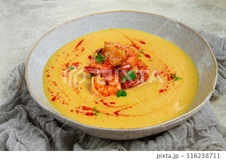 pumpkin cream soup with shrimp, herbs and spices, homemade, no people, 116238711