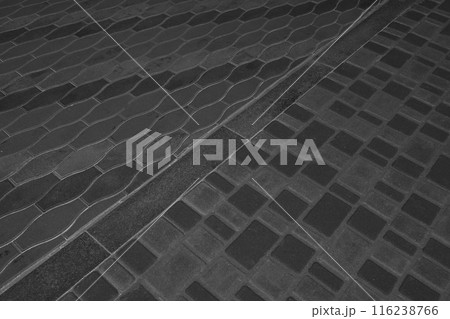 Two Kinds Paving Black Tiles Dividing Border Curb Mosaic Stone Street Road City Texture Background Dark 116238766