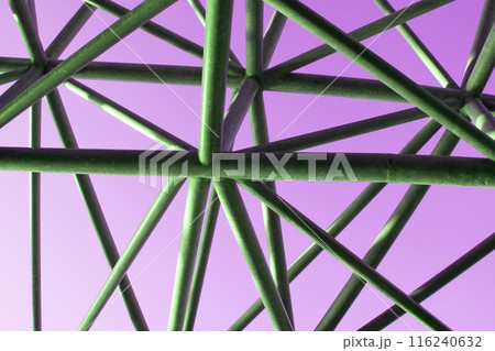 Abstract metal figure on a colorful pink background, artistically welded metal pipes, fragment of scaffolding in NYC Abstract metal figure on a colorful pink background, artistically welded metal pipes, fragment of scaffolding in NYC 116240632