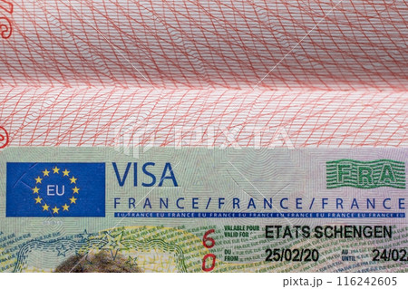 French visa stamp in a travel passport, France Schengen visa, immigrant, work and travel documents, emigration, immigration, tourism concept French visa stamp in a travel passport, France Schengen visa, immigrant, work and travel documents, emigration, immigration, tourism concept 116242605