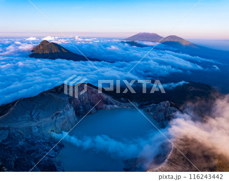 Aerial view Kawah Ijen volcano with turquoise sulfur water lake at sunrise.Amazing nature landscape view at East Java, Indonesia. Natural landscape background 116243442
