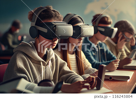 schoolchildren in vr headsets during lesson in classroom, blurred background schoolchildren in vr headsets during lesson in classroom, blurred background 116243804