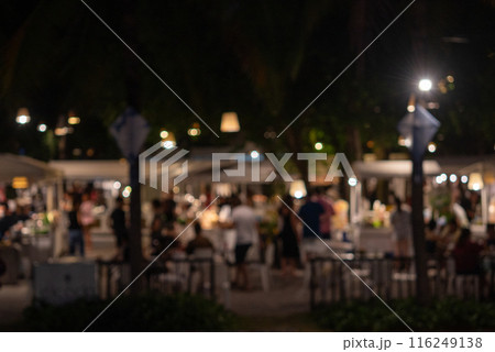 abstract blurred festival food market night light bokeh background. People walking travel street food and stalls 116249138