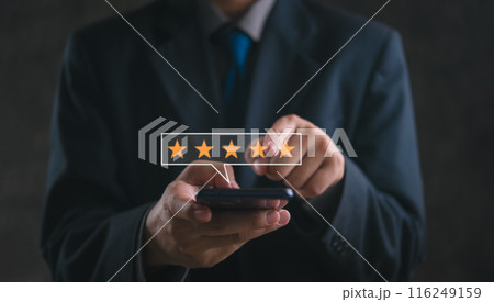 Businessman using mobile phone review rating feedback 5 star satisfaction marketing technology digital online customer service 116249159