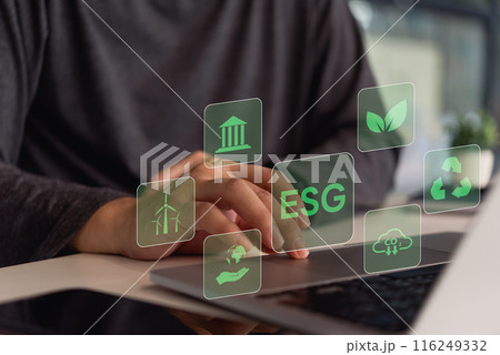 A person interacts with a digital interface showing icons related to ESG (Environmental, Social, Governance) principles.. 116249332