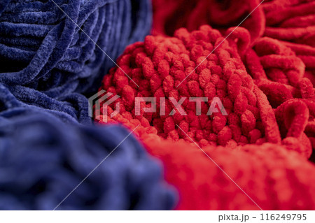 new soft blue threads with traces of other threads in close-up new soft blue threads with traces of other threads in close-up 116249795