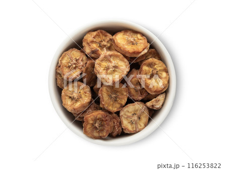Bowl with dried healthy organic banana bites isolated on white background. Bowl with dried healthy organic banana bites isolated on white background. 116253822