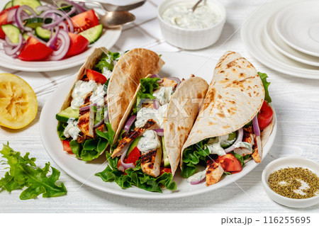 grilled chicken street tacos on a white plate grilled chicken street tacos on a white plate 116255695