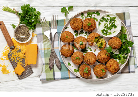 fried broccoli cheese balls with sour cream sauce fried broccoli cheese balls with sour cream sauce 116255738