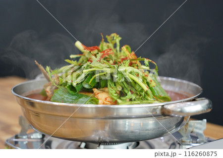 Korean fish stew made with plenty of red pepper powder and seasoned with various vegetables 116260875