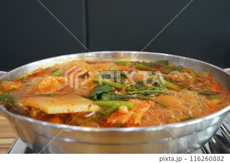 Korean fish stew made with plenty of red pepper powder and seasoned with various vegetables Korean fish stew made with plenty of red pepper powder and seasoned with various vegetables 116260882