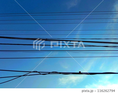 Electricity post and wires with blue sky Electricity post and wires with blue sky 116262794