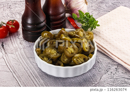 Sliced pickled jalapeno spicy pepper 116263074