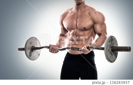 Young bodybuilder with barbell in studio on white background 116263937