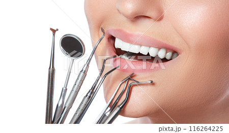 Smile and detnal tools on white background Smile and detnal tools on white background 116264225