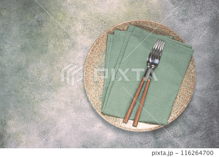 a plate with a kitchen towel and two forks, food wallpaper, food concept, top view, no people, 116264700