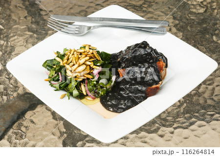 Beef meat and black sauce with beans 116264814