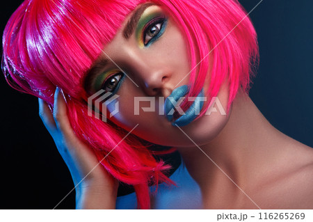 Potrait of young woman with pink hair Potrait of young woman with pink hair 116265269