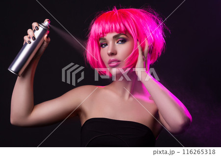 Potrait of young woman with pink hair Potrait of young woman with pink hair 116265318