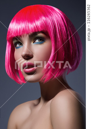 Potrait of young woman with pink hair Potrait of young woman with pink hair 116265362