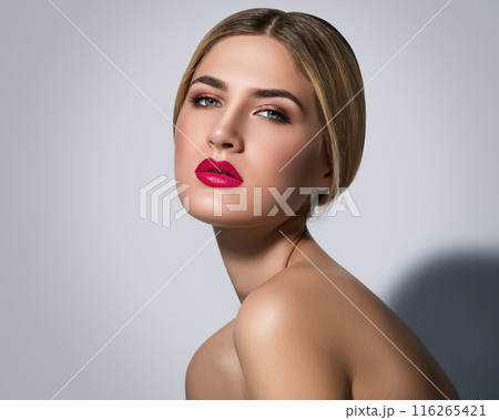 Portrait of beautiful blonde girl with red lips Portrait of beautiful blonde girl with red lips 116265421