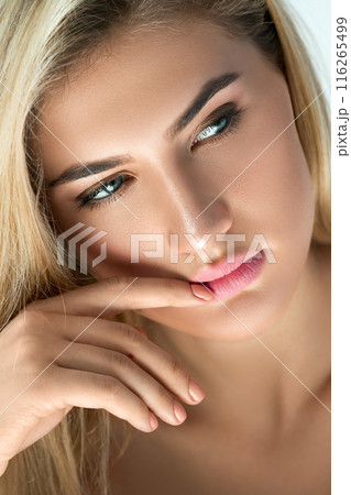 Portrait of beautiful blonde woman in studio Portrait of beautiful blonde woman in studio 116265499