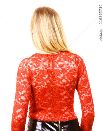 Elegant young woman wearing red top Elegant young woman wearing red top 116265730