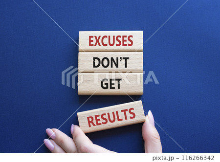 Results symbol. Concept words Excuses do not get results on wooden blocks. Businessman hand. Beautiful deep blue background. Business and Excuses do not get results concept. Copy space Results symbol. Concept words Excuses do not get results on wooden blocks. Businessman hand. Beautiful deep blue background. Business and Excuses do not get results concept. Copy space 116266342