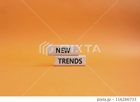 New Trends symbol. Wooden blocks with words New Trends. Beautiful orange background. Business and New Trends concept. Copy space. New Trends symbol. Wooden blocks with words New Trends. Beautiful orange background. Business and New Trends concept. Copy space. 116266733
