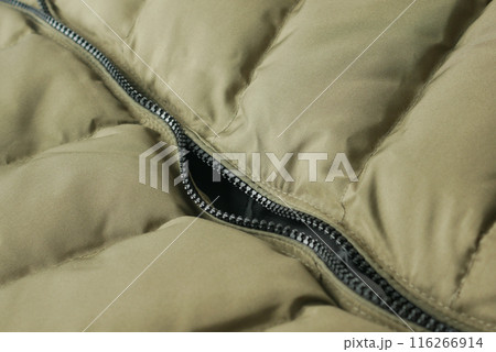 Close-up of a zipper with a slider 116266914