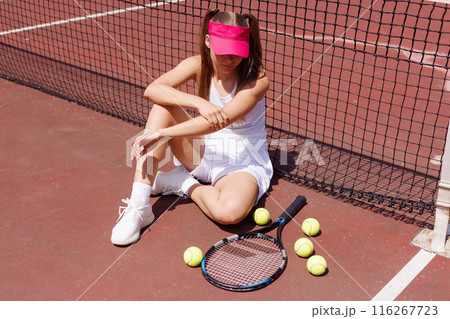 a young tennis player was injured while playing tennis, big tennis concept, sports injuries 116267723