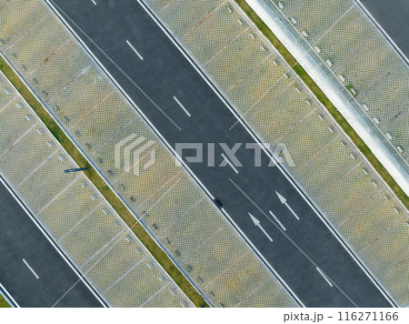 Modern parking lot in city 116271166