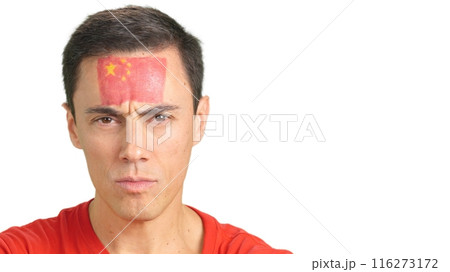 Serious man with a chinese flag painted on the face 116273172